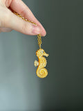 14k bail big seahorse in gold mother of pearl shell carving