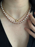 Genuine fresh water peachy pink pearls 14k ends