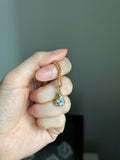 14k yellow gold lovebug with natural topaz