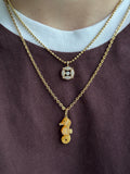 14k bail baby seahorse in gold mother of pearl shell carving