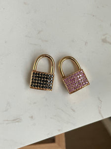 14k rosy working padlock in with dark blue (almost black) sapphire