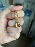 14k yellow gold small ladybug with natural garnet