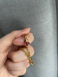 14k yellow gold small ladybug with natural garnet