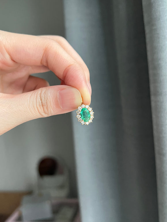 Old stock 18k yellow gold Natural Emerald oval cut with diamonds