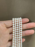 Genuine pale pink baby pearls 14k ends